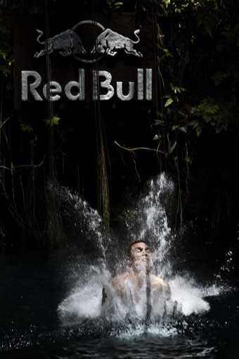 Cliff diver, Michal Navratil of Czech Republic, dives from the 27.25 metre platform during the first round of the second stop of the Red Bull Cliff Diving World Series at Ik Kil cenote in Chichen Itza, Yucatan, Mexico on April 9th 2011.