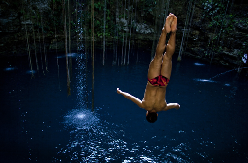 Jorge Ferzuli of Mexico practices during the second training session of the second stop of the Red Bull Cliff Diving World Series at Ik Kil cenote in Chichen Itza, Yucatan, Mexico on April 9th 2011.