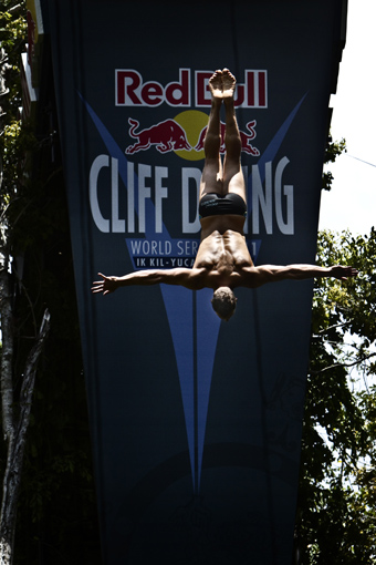 Cliff diver, Michal Navratil of Czech Republic, dives from the 27.25 metre platform during the first round of the second stop of the Red Bull Cliff Diving World Series at Ik Kil cenote in Chichen Itza, Yucatan, Mexico on April 9th 2011.