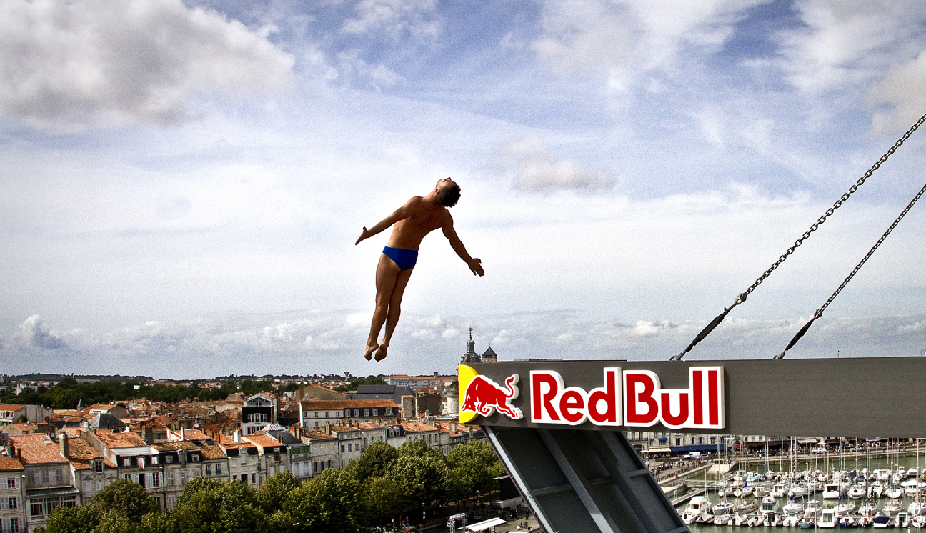 Blake Aldridge of Great Britain dives from the 27.5 metre platform the first training session of the fourth stop of the Red Bull Cliff Diving World Series at La Rochelle, France on June 16th 2011.