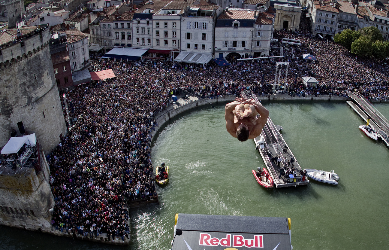 Michal Navratil of the Czech Republic dives from the 27.5 metre platform at the fourth stop of the Red Bull Cliff Diving World Series at La Rochelle, France on June 18th 2011.