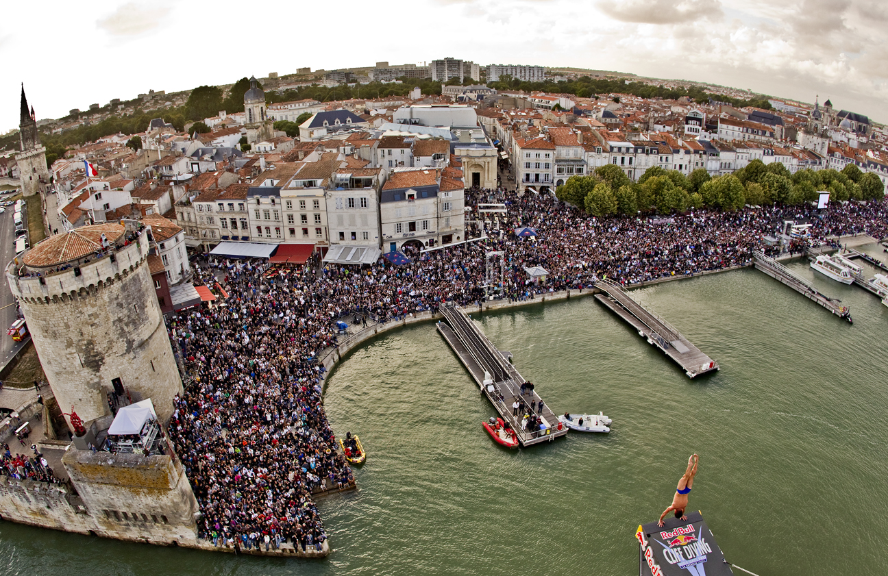 Michal Navratil of the Czech Republic dives from the 27.5 metre platform at the fourth stop of the Red Bull Cliff Diving World Series at La Rochelle, France on June 18th 2011.