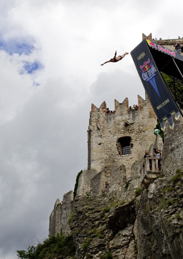 Kent De Mond of the USA dives from the 27 metre platform during the second round of the of the fifth stop of the Red Bull Cliff Diving World Series, Malcesine, Italy on July 24rd