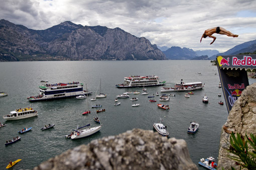 Gary Hunt of Great Britain dives from the 27 metre platform on Scaliger Castle during the fifth stop of the Red Bull Cliff Diving World Series at Lake Garda in Malcesine, Italy on July 24th 2011.