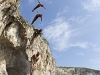 Hassan Mouti of France dives from the 26.8 metre platform during the second training session prior to the third stop of the Red Bull Cliff Diving World Series at Lake Vouliagmeni in Athens, Greece on May 21st 2011.