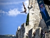 Michal Navratil of the Czech Republic dives from the 27 metre platform during the first training session prior to the fifth stop of the Red Bull Cliff Diving World Series, Malcesine, Italy on July 22th 2011.
