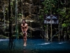 Cyrille Oumedjkane of France prepares for his water entry after diving from the 27.25 metre platform during the first round of the second stop of the Red Bull Cliff Diving World Series at Ik Kil cenote in Chichen Itza, Yucatan, Mexico on April 9th 2011.